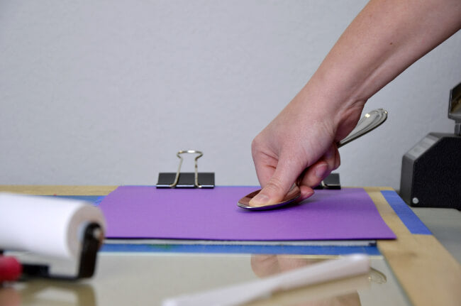 Hand burnishing the Horned Frog Linocut