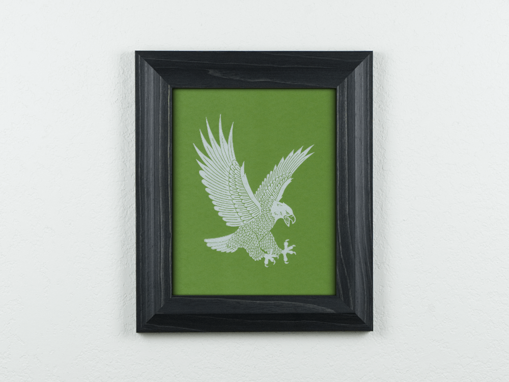 Eagle linocut white ink on green paper